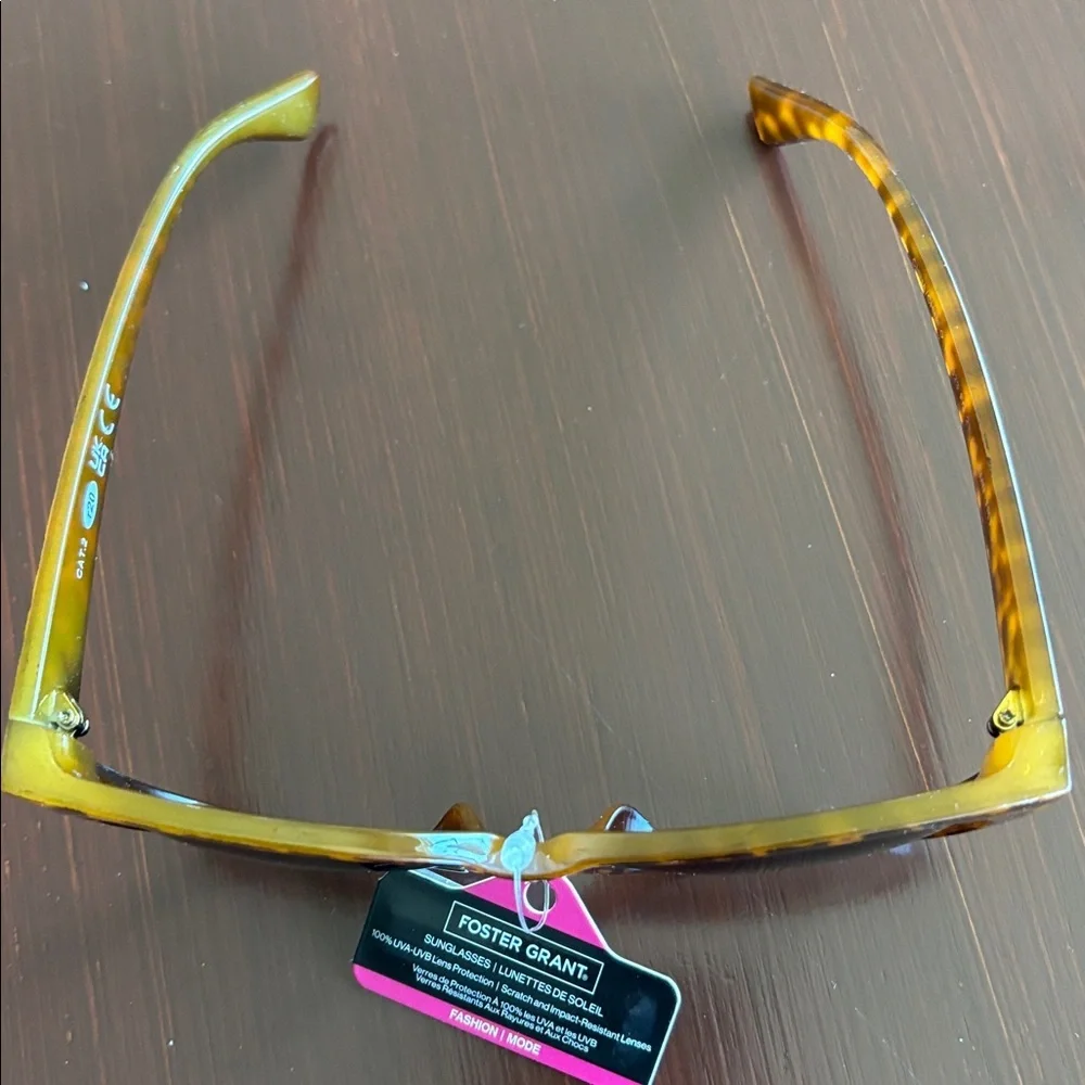 Foster Grant 100% UVA-UVB protection leopard print, gold tone beaded frame edge